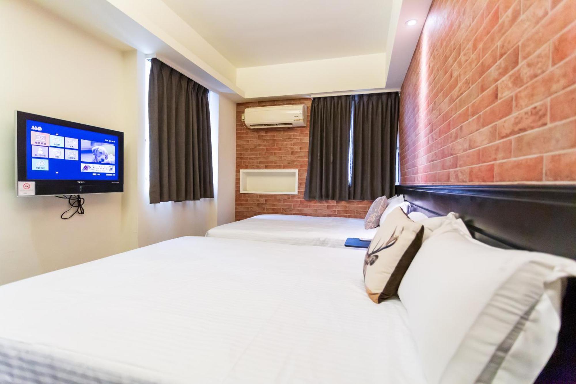 Newrise Hotel Гаосюн Экстерьер фото